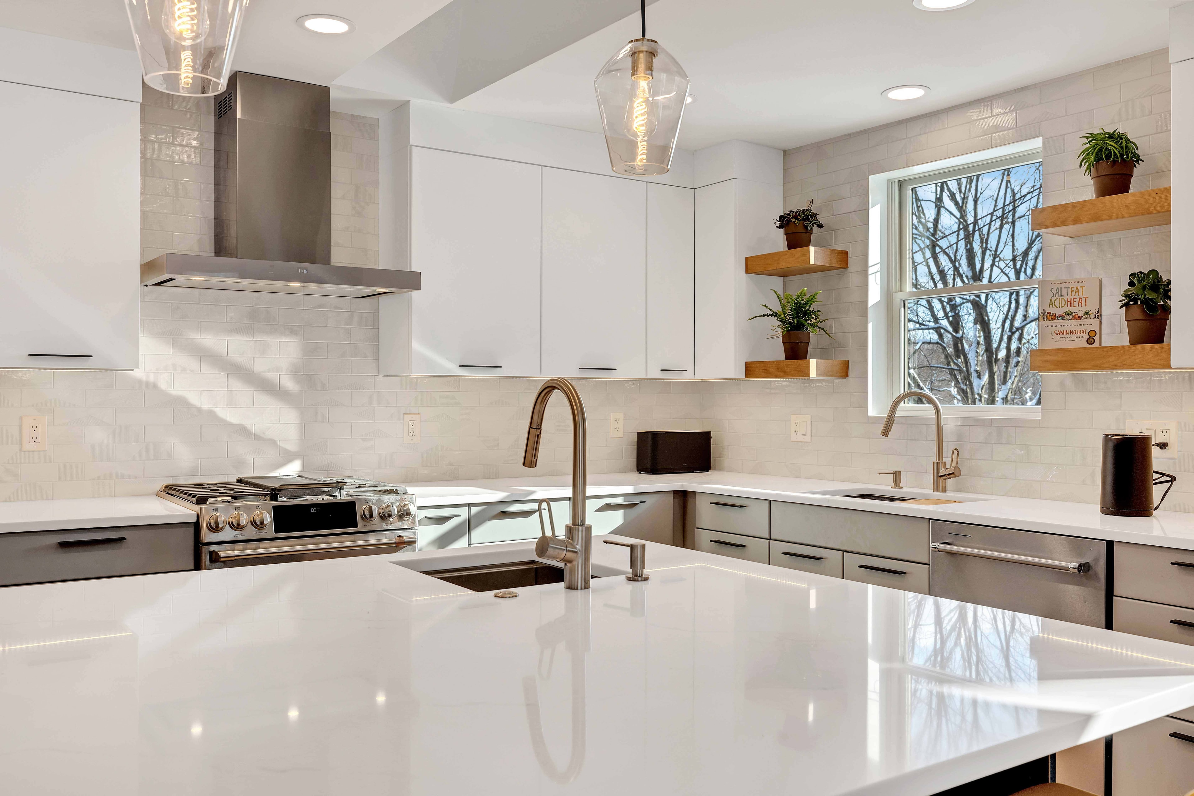Kitchen backsplash detail Maryland — white subway tile, upper cabinet detail, recycled glass countertop, eco-friendly kitchen renovation