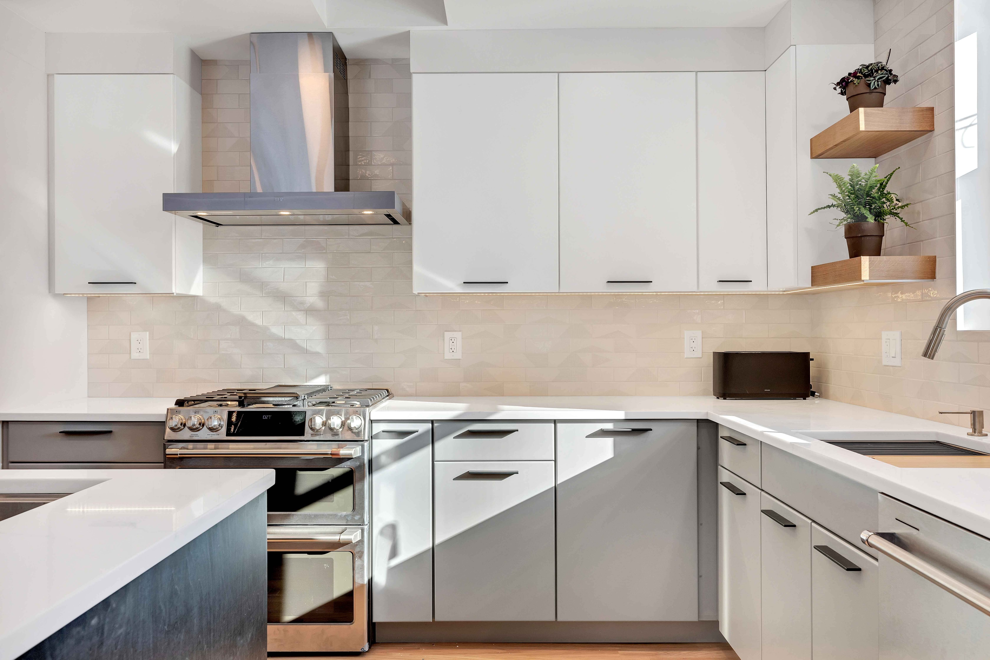 Gray shaker kitchen cabinets close-up Maryland — matte black hardware, white quartz countertop, sustainable kitchen remodel by Alleco Center